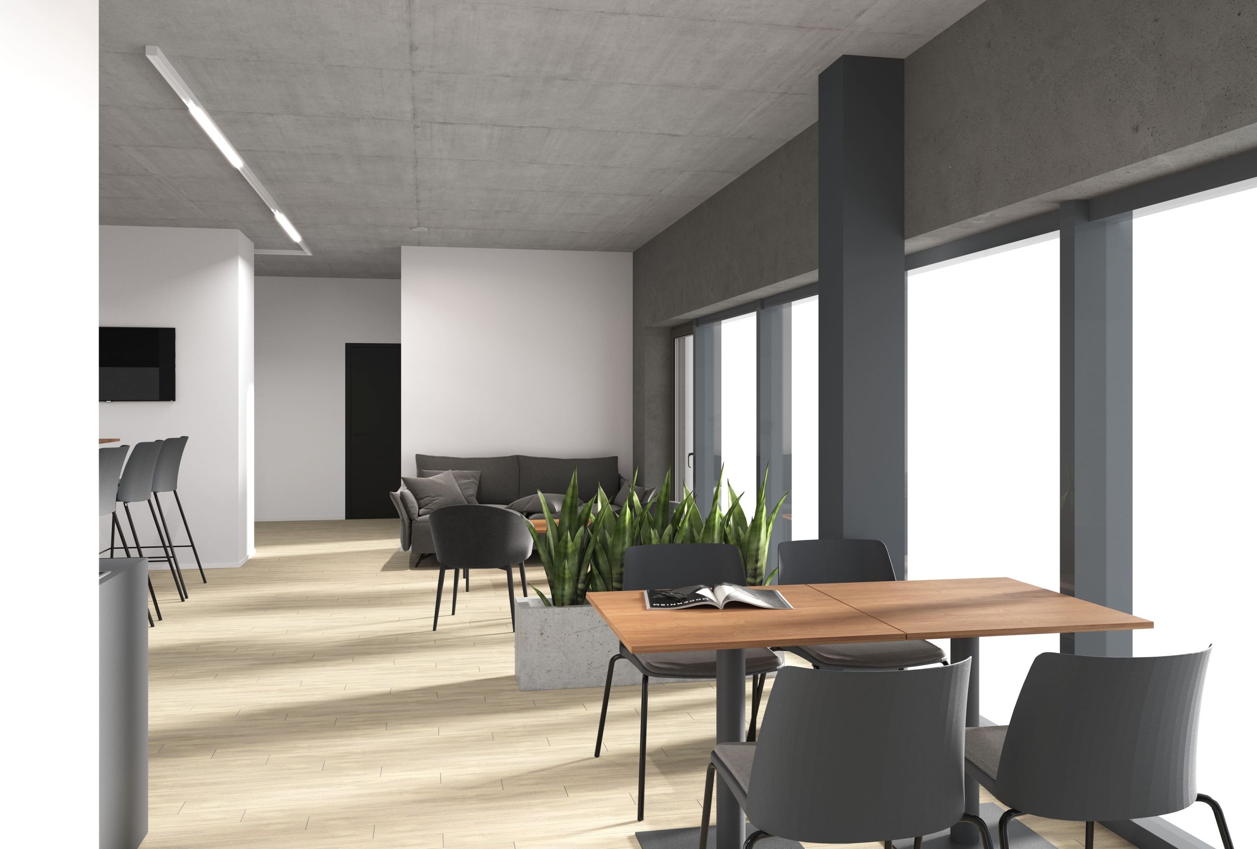 Aufnahme einer Sitzecke und eines Esstisches im Comfort Zimmer von MOOI Serviced Apartments in St. Gallen